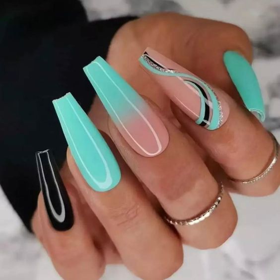 Black and Teal Swirl Nail Design