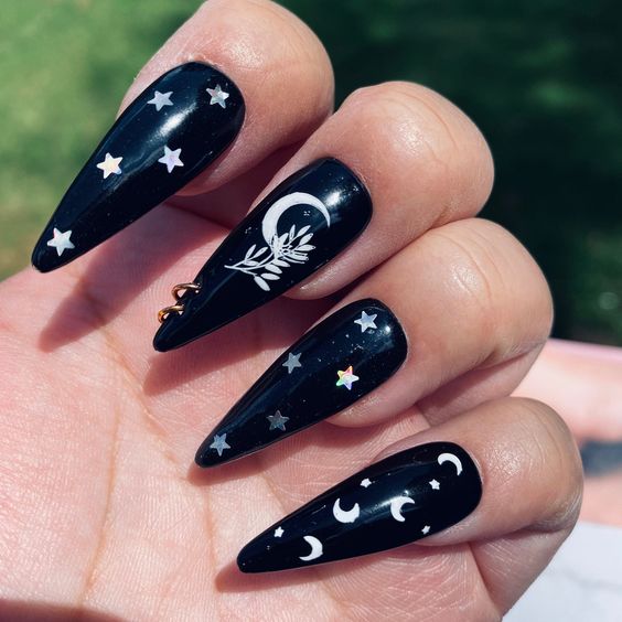 Dark Black Star and Moon Stiletto Nails