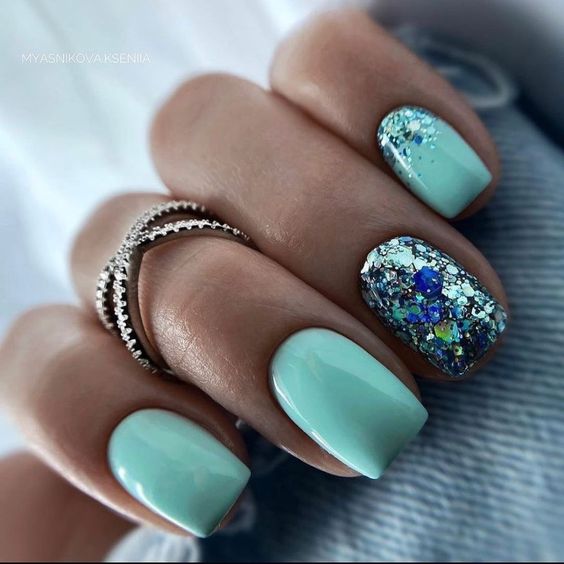 Glitter Confetti Teal Nail Design