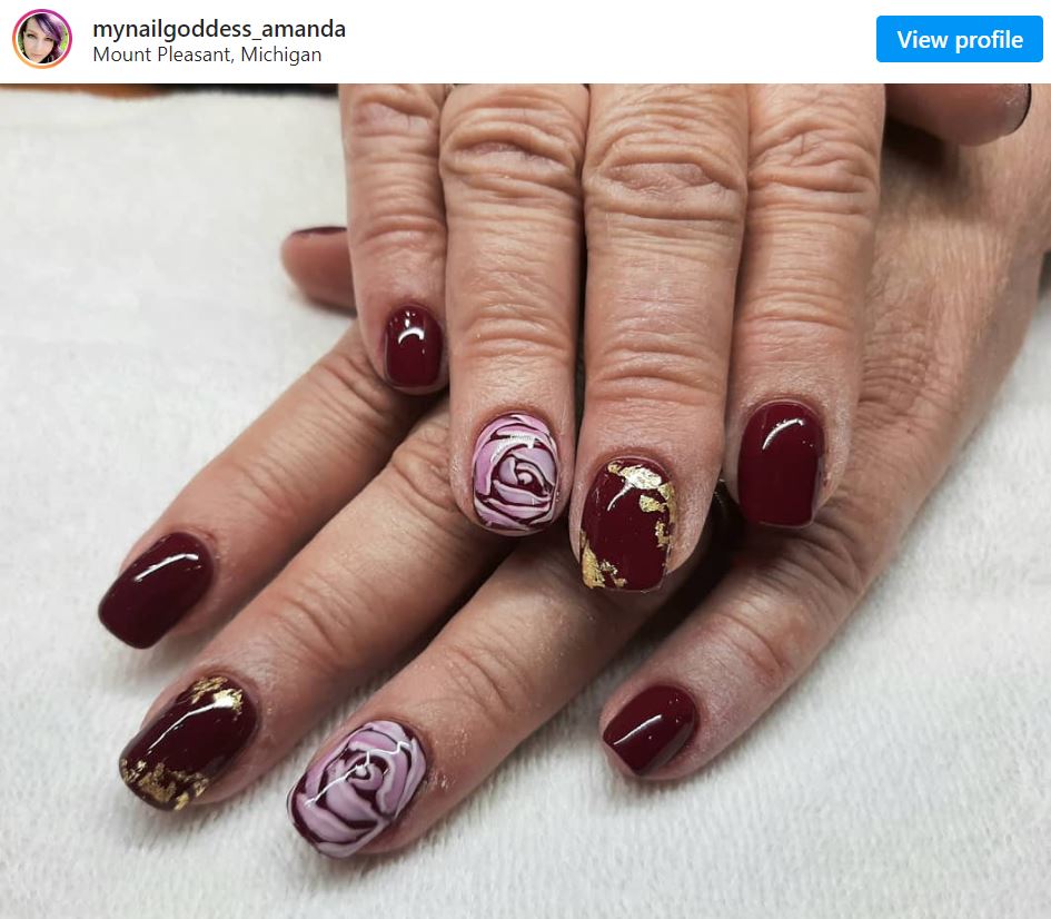 Maroon Nails With Rose Detailing